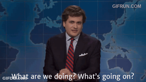 Man In Suit Asking What Are We Doing GIF