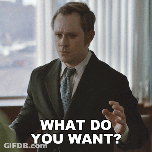 Man In Suit Asking What Do You Want GIF