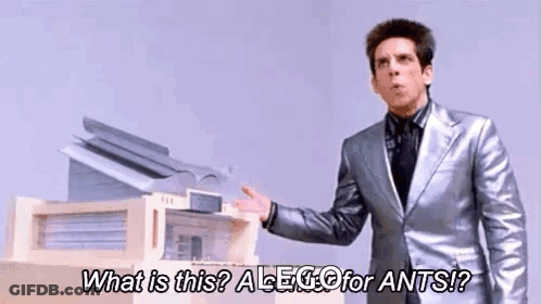 Man In Suit Asking What Is This GIF