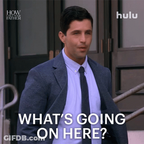 Man In Suit Asking What's Going On GIF