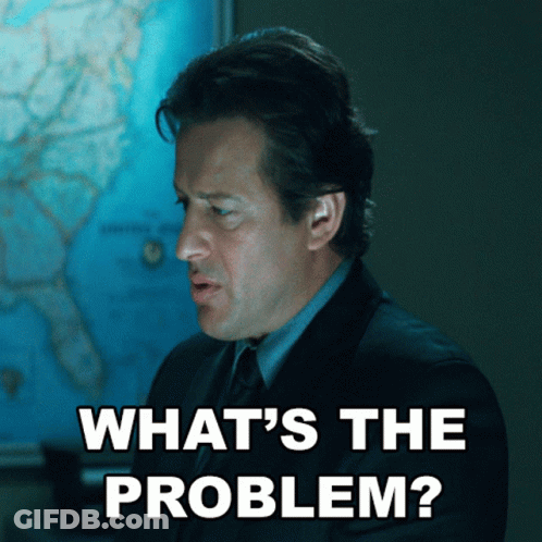 Man In Suit Asking What's The Problem GIF