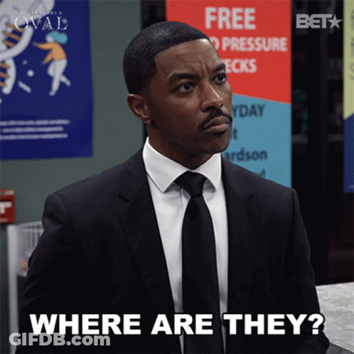Man In Suit Asking Where Are They GIF
