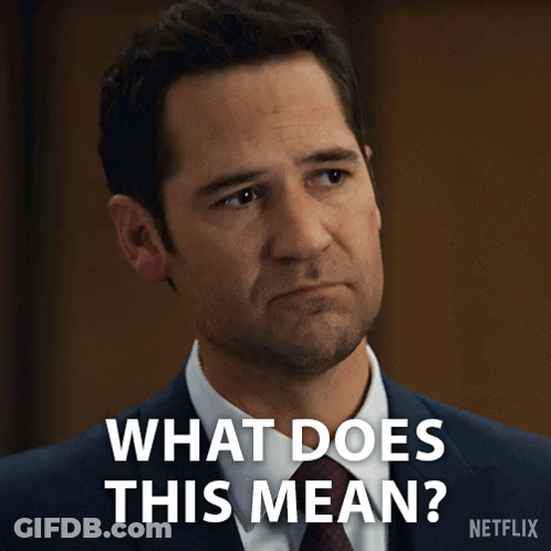 Man In Suit Asks What Does This Mean GIF