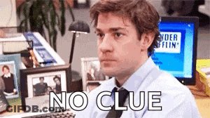 Man In Suit At Computer Saying No Clue GIF