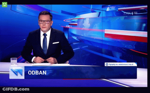 Man In Suit At Desk With Odban Sign GIF