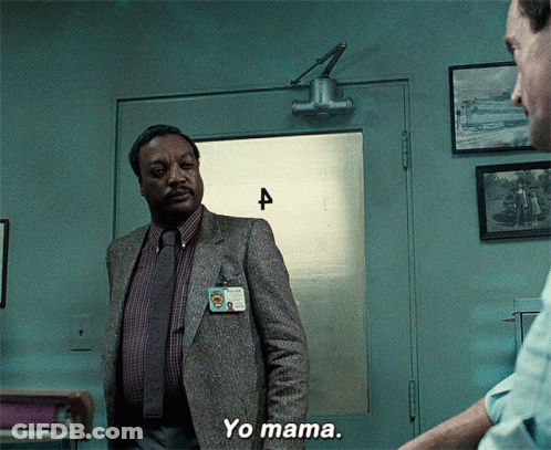 Man In Suit At Door Number Four GIF