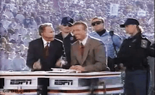 Man In Suit At ESPN Desk GIF