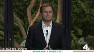 Man In Suit At Mayoral Debate GIF