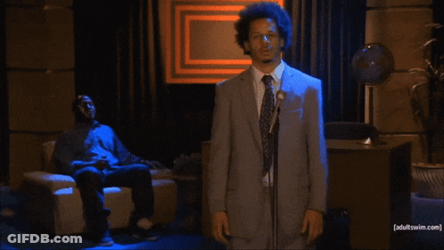 Man In Suit At Microphone Adult Swim.com GIF