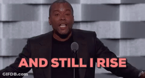 Man In Suit At Microphone Saying And Still I Rise GIF