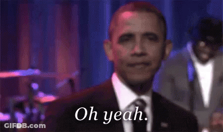 Man In Suit At Microphone Saying Oh Yeah GIF