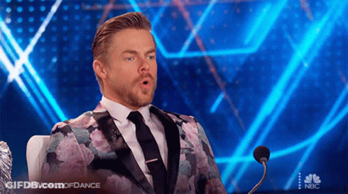 Man In Suit At Microphone World Of Dance GIF