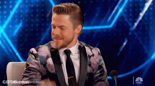 Man In Suit At Microphone World Of Dance GIF