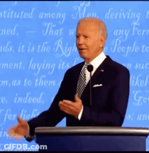 Man In Suit At Podium With Blue Background Saying That GIF