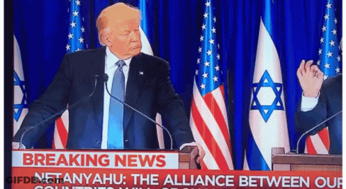 Man In Suit At Podium With Microphones Breaking News Sign GIF