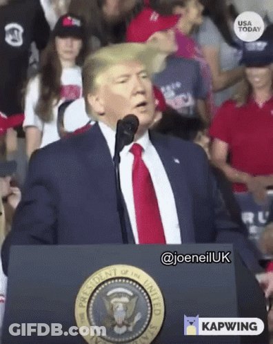 Man In Suit At Podium With Presidential Seal GIF
