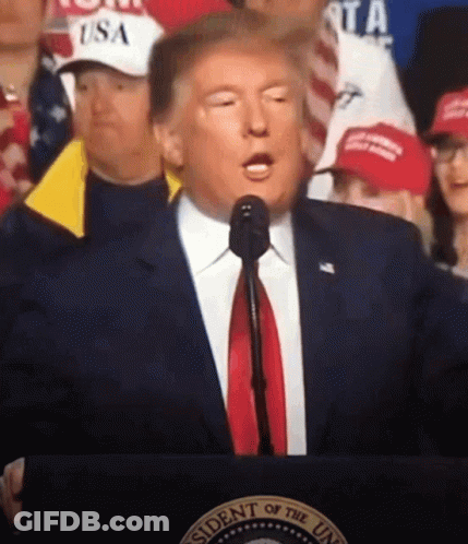 Man In Suit At Podium With Presidential Seal GIF