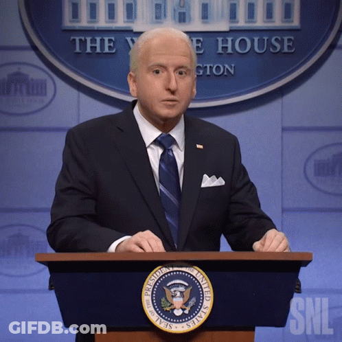 Man In Suit At Presidential Podium GIF