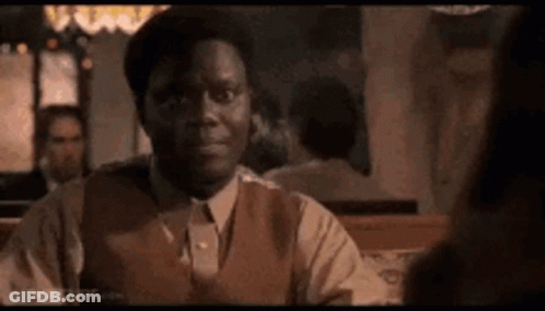 Man In Suit At Restaurant Table GIF