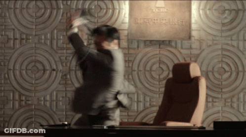 Man In Suit At TCCO Sign GIF