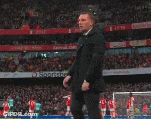 Man In Suit Before Arsenal.com Ad GIF