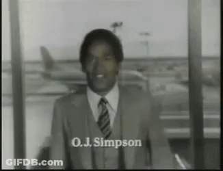 Man In Suit Before Police On Evening Express GIF