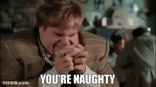 Man In Suit Bites Hand Says You're Naughty GIF