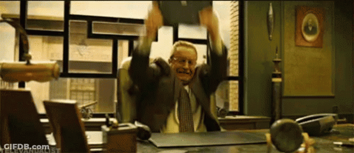 Man In Suit Breaking His Laptop GIF