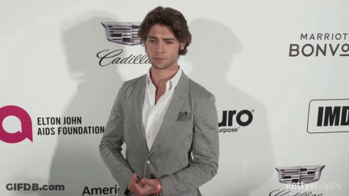 Man In Suit By Elton John AIDS Foundation Ad GIF