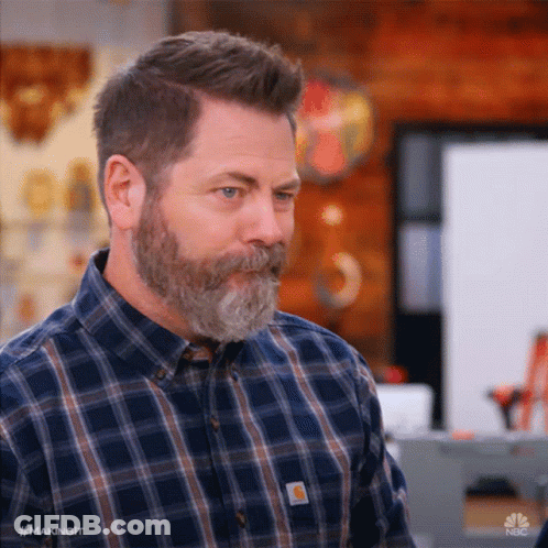 Man In Suit By Trophy Wall GIF