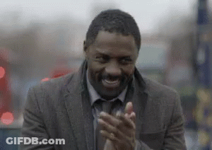 Man In Suit Clapping And Smiling GIF