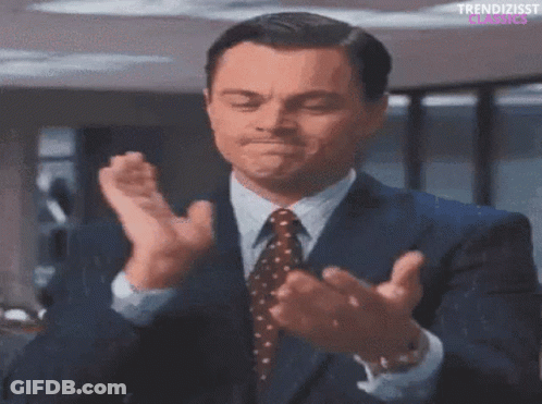 Man In Suit Clapping Hands GIF