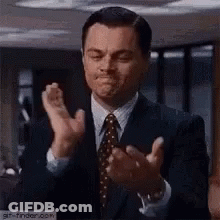 Man In Suit Clapping Hands GIF