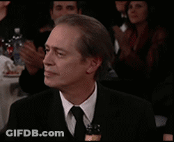 Man In Suit Clapping In Crowd GIF