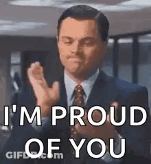Man In Suit Clapping Proud GIF