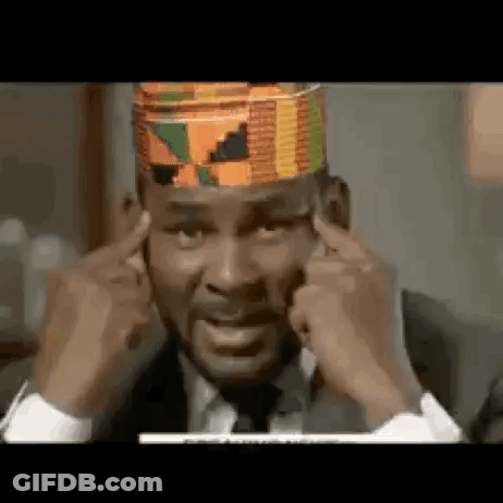 Man In Suit Covering Ears With Hat GIF
