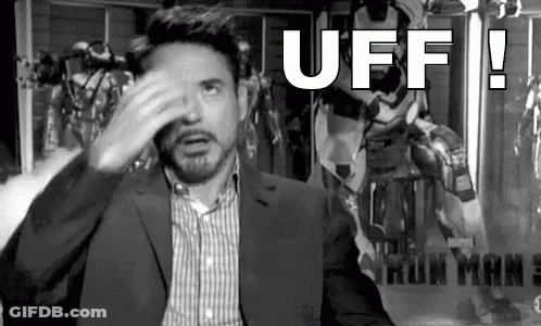 Man In Suit Covering Face Iron Man 3 Poster GIF