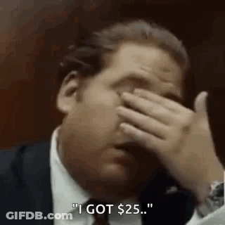 Man In Suit Covering Face Says I Got 25 GIF