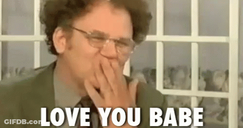 Man In Suit Covering Mouth Saying I Love You Babe GIF