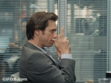 Man In Suit Covering Nose GIF