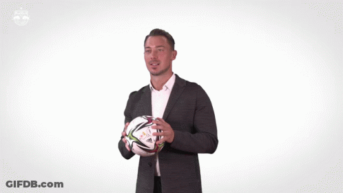 Man In Suit Dancing At Redbull Logo GIF