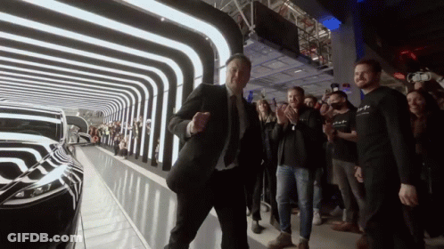 Man In Suit Dancing Before Crowd GIF