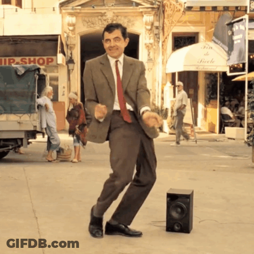 Man In Suit Dancing GIF
