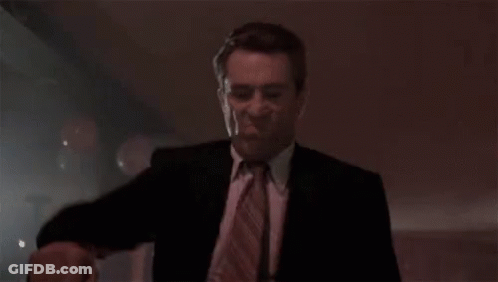 Man In Suit Dancing In Dark Club GIF