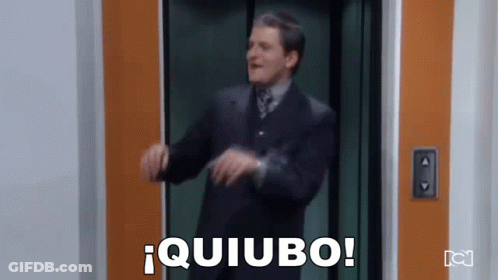 Man In Suit Dancing In Elevator Saying Quiubo GIF