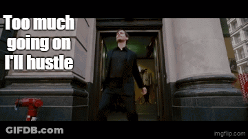 Man In Suit Dancing In Front Of Building Saying Too Much Going On I'll Hustle GIF