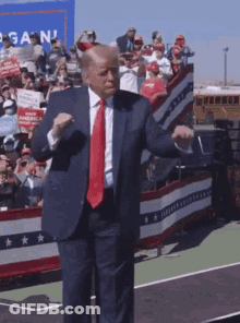 Man In Suit Dancing In Front Of Crowd GIF