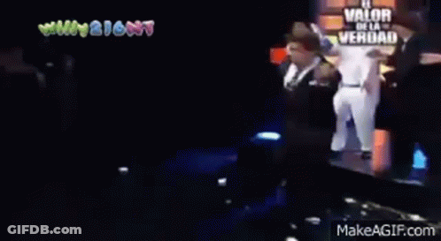 Man In Suit Dancing In Front Of Crowd GIF