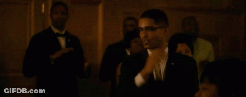 Man In Suit Dancing In Front Of Crowd GIF