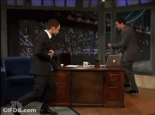 Man In Suit Dancing In Front Of Laptop GIF